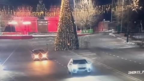 Show-off Lada driver smashes into Christmas tree
