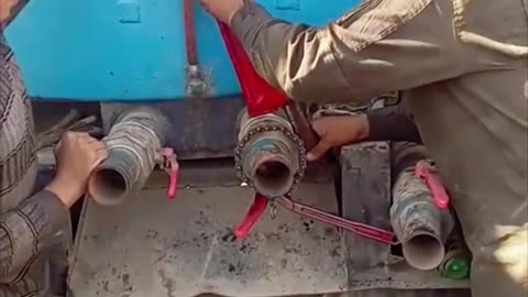 Men Save Cat Stuck Inside Water Tanker Truck Pipe