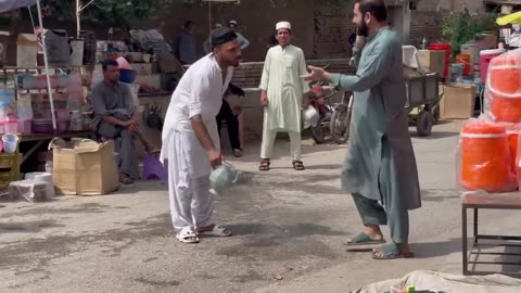 Throwing water on people | the guy tried to grab me😱| rickshaw man lost his slippers | joker pranks