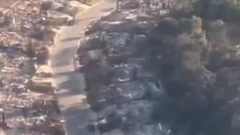 Aerial views taken during Trump's trip shows destruction wrought by wildfires in Los Angeles.