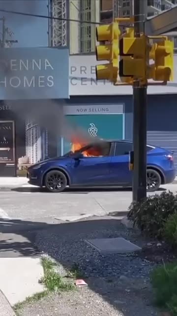 Electric car shuts down, traps the driver inside, then catches fire.