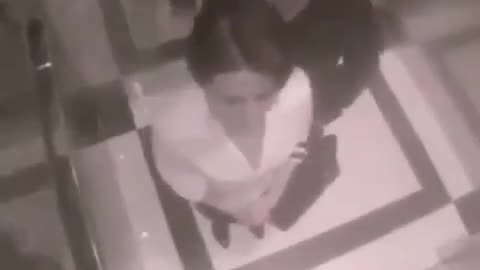 Usual suspect molesting a woman in an elevator - she hits back hard ;-)