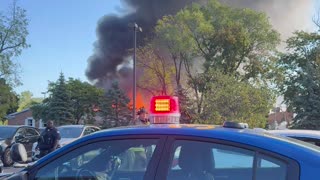 Mormon Church remains on fire after mass shooting in Grand Blanc, Michigan.