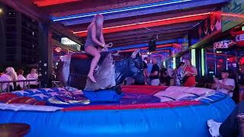 😍 Bold Girl on a Bull | Mechanical Bull Riding | Bull Riding in Benidorm