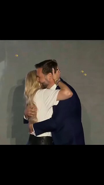 Erika Kirk and JD Vance embrace