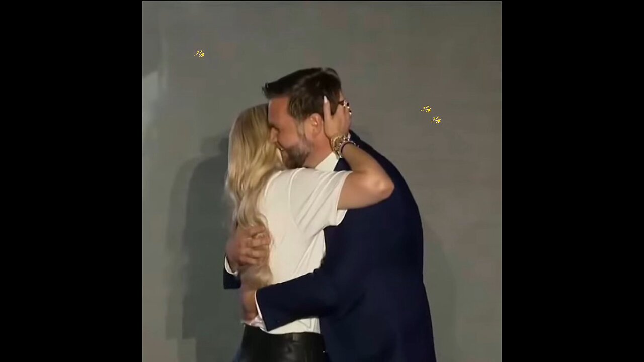 Erika Kirk and JD Vance embrace