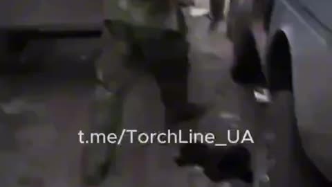 Russian Soldiers Recovering Survivors of Drone Strike