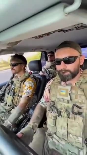 Ukranian Mercenaries going off to die for a lie... Bolshevism