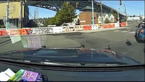 Dashcam footage shows a stolen vehicle evading Seattle PD & jumping the open University Place Bridge 