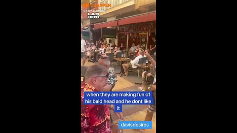 making fun of the bald man's head
