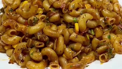 🍝✨ Dive into the world of macaroni pasta perfection! 🧀🌿