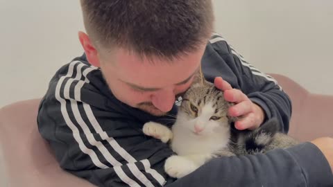 Cat Reaction to Human Dad's Love