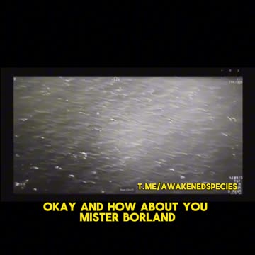 Military surveillance video shows a UFO splitting a Hellfire missile in mid air.