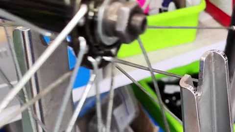 Bicycle wheel alignment. Restoring the brake track on the bicycle wheel rim.