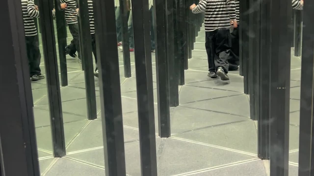 Boy Runs Headfirst Into Mirror Maze