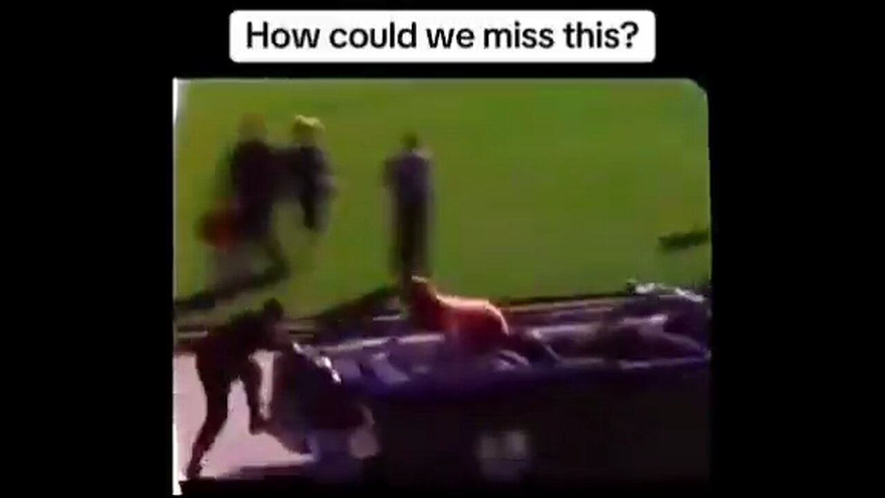 Why would president Kennedys WIFE Run out the back onto the trunk