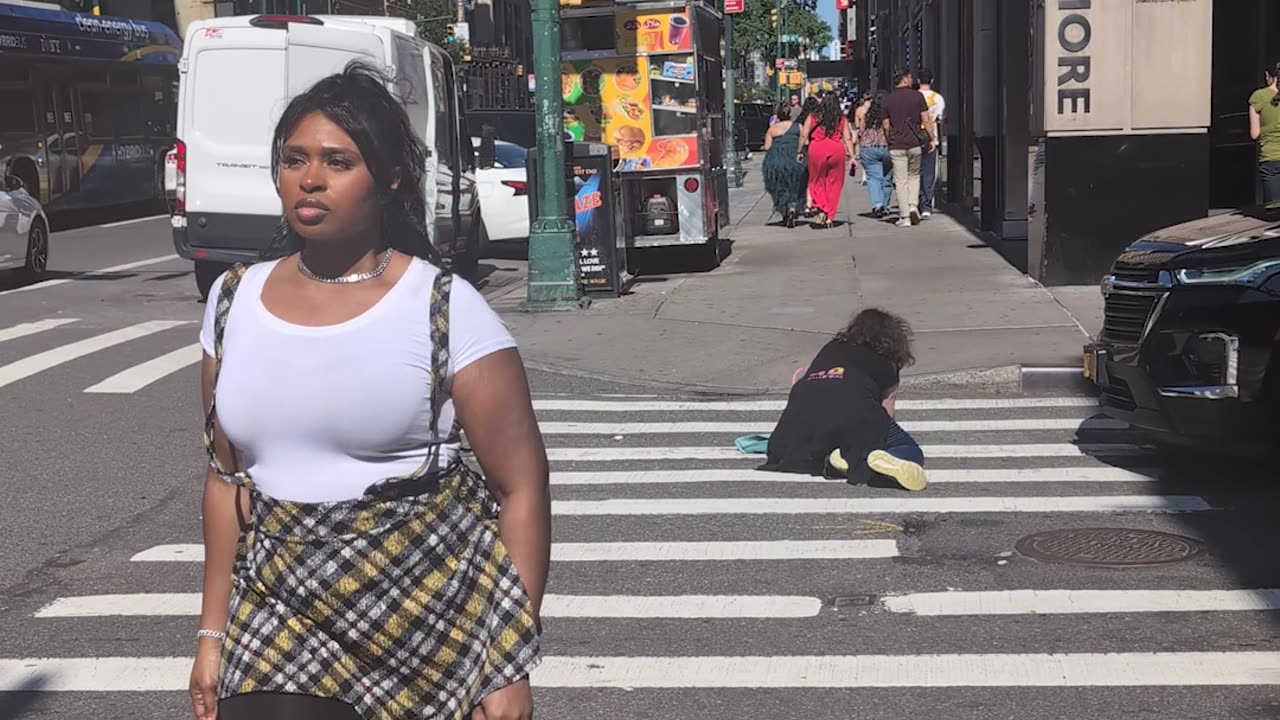 Powerful Strut Humbles Nearby Pedestrian