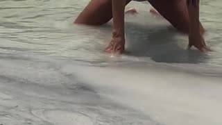 The making of a bikini shoot at the water front