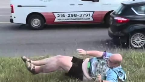 Clumsy man doesn’t like being filmed in public.