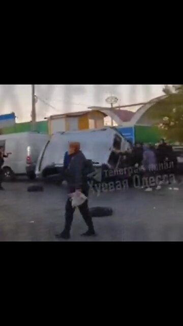 Ukrainians in Odessa chased away military recruiters and flipped their minivan