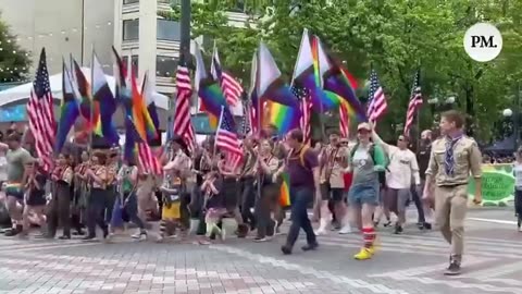 Seattle Pride Parade kicks off being led by children with Scouts of America.