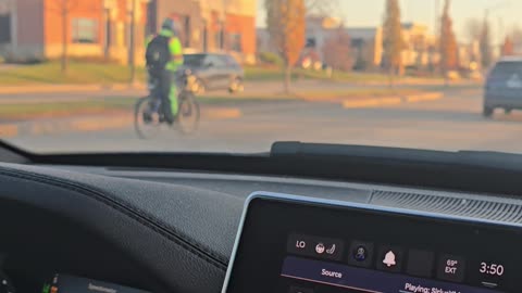 IDIOT RIDING BIKE IN TRAFFIC