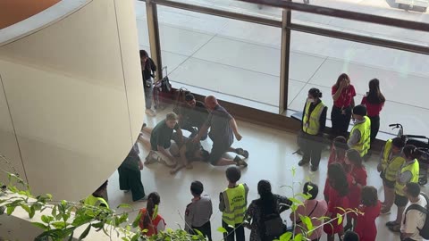 Man Passes Out at Cambodian Airport