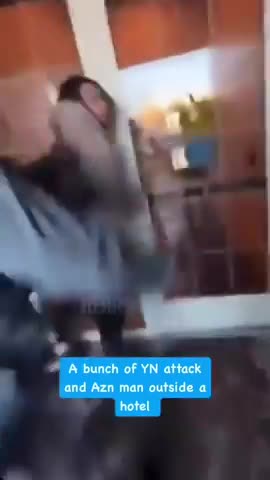 A pack of black men laugh while attacking an Asian man in Minnesota.