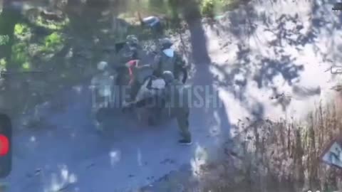 Russians Throw Wounded Soldier Off the Back of Motorbike