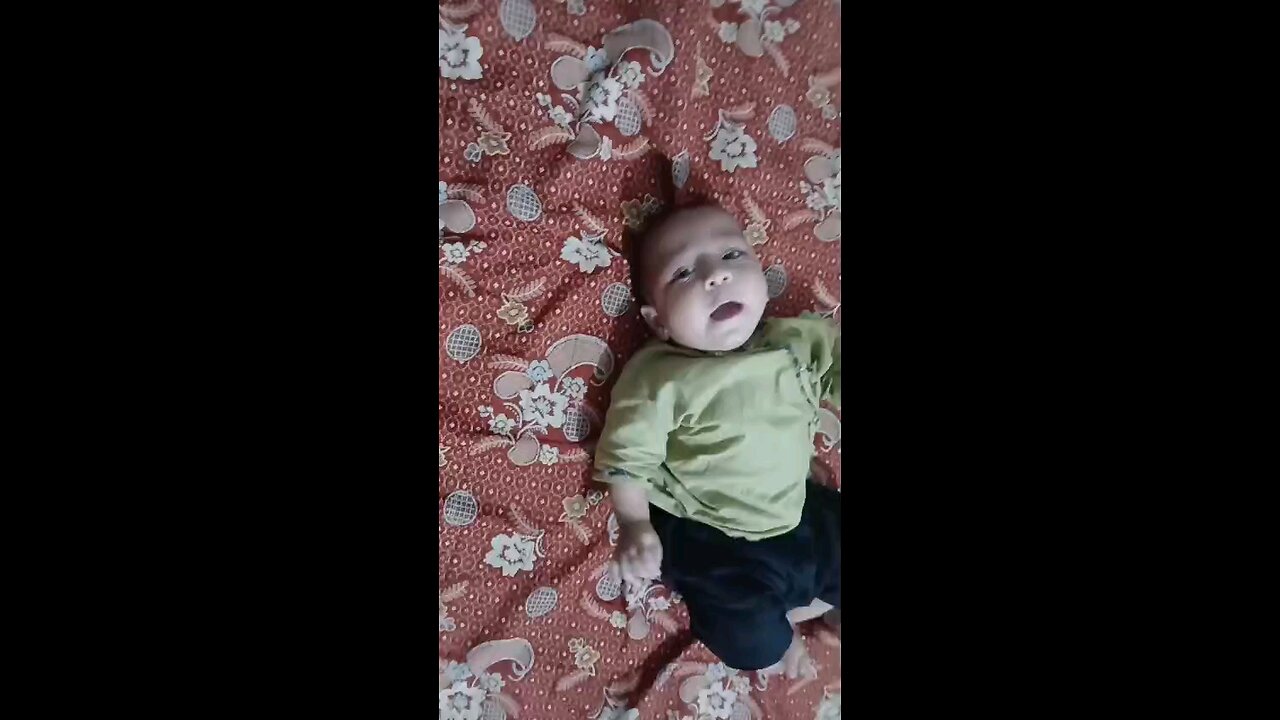 Adorable Baby on a Colorful Blanket