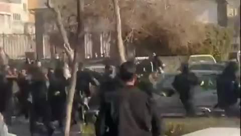 IRAN: Protesters have begun fighting with Basij forces in the city of Mashhad.