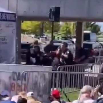 What do you notice in this Charlie Kirk video from the LEFT side as he is carried away!?