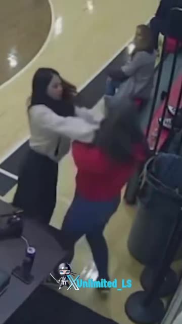 Two mothers fight at elementary school basketball game, caught on camera