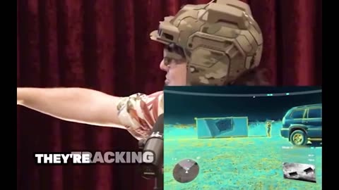 Palmer Luckey shows off his “EagleEye” remote Killing AI helmet.