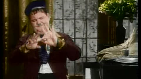 laurel and hardy spying man