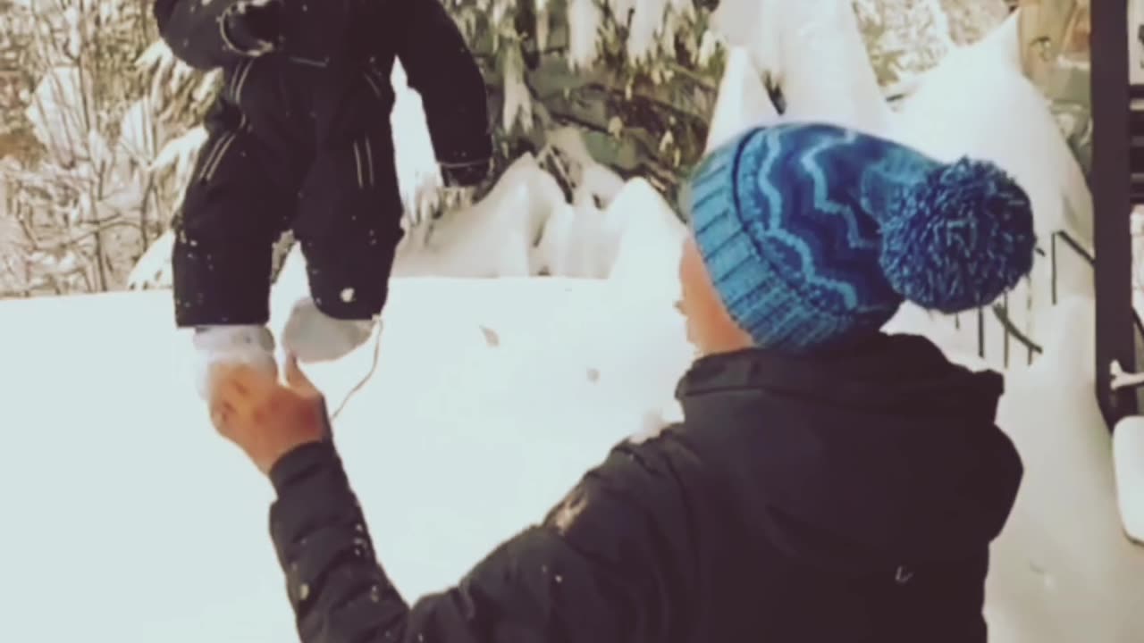 'Watch how his mom is going to through him in Snow'.😊💕