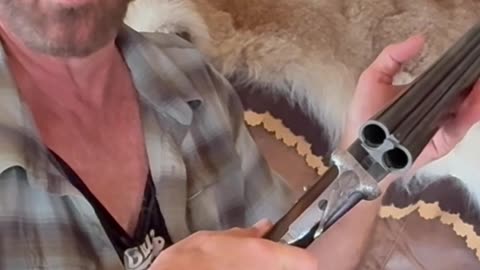 Why does Tim prefer side by side shotguns?