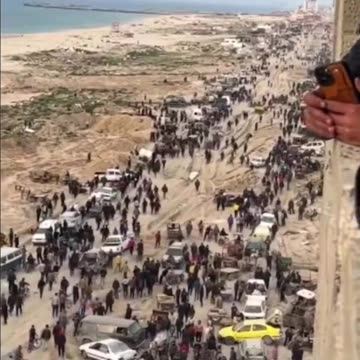 Thousands of people waiting for food to be air dropped on Gaza strip