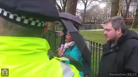 At Speakers Corner a Christian proclaims Jesus is the Son of God.