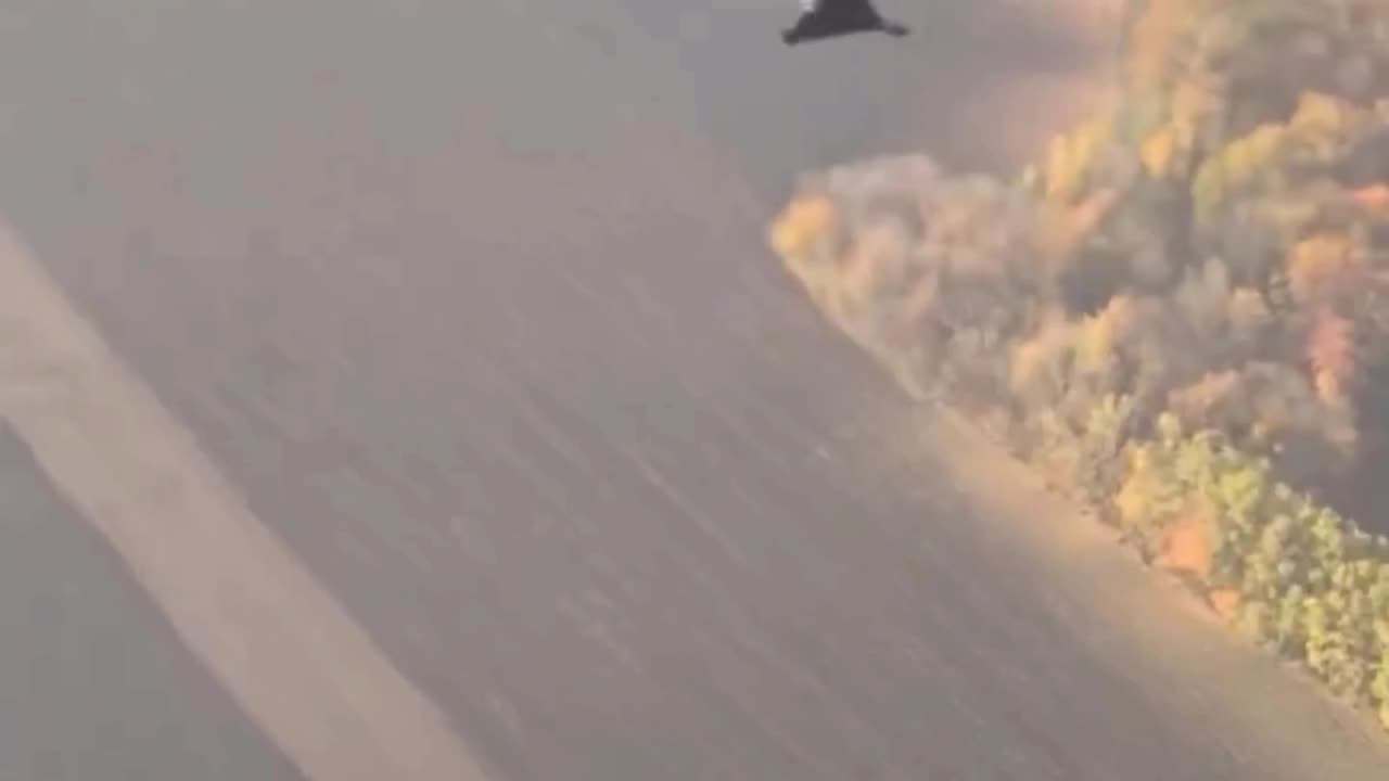 Ukrainian Mi8 Helicopter Shooting Down Russian Attack Drone with a Minigun