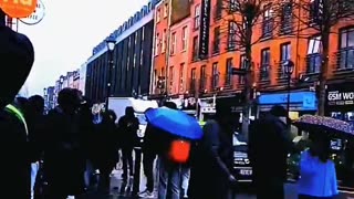 Irish man stands still in Dublin for 2 minutes. Look how many foreigners walk by.