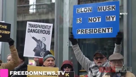 Anti-Elon Activists Stage A Protest At A Tesla Dealership & Flip Customers Off!