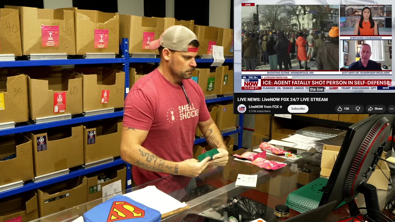 Packing and shipping while watching the news.