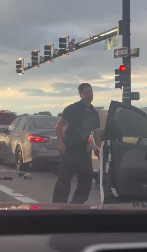 Venezuelan window washers in Denver Colorado fight with driver