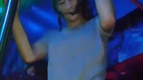 Latino Femboy Dances in Nightclub.