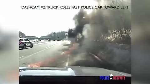 Burning Truck Rolls Toward Police Cars And Traffic