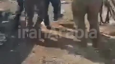 An old man from Al-Awaeyin is being killed in front of the eyes of children