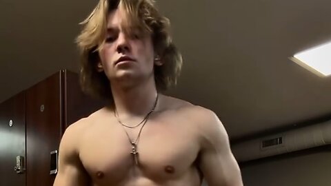 18 years old teen boy flexing muscles