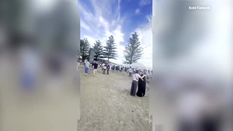 Eyewitness video shows celebrations, then terror, at Bondi Beach