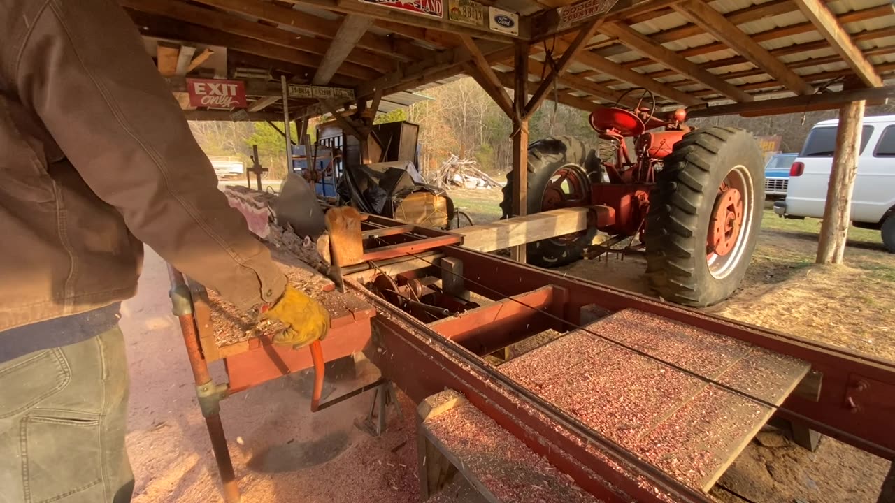 Sawing red Cedar at the sawmill with the Super M Farmall